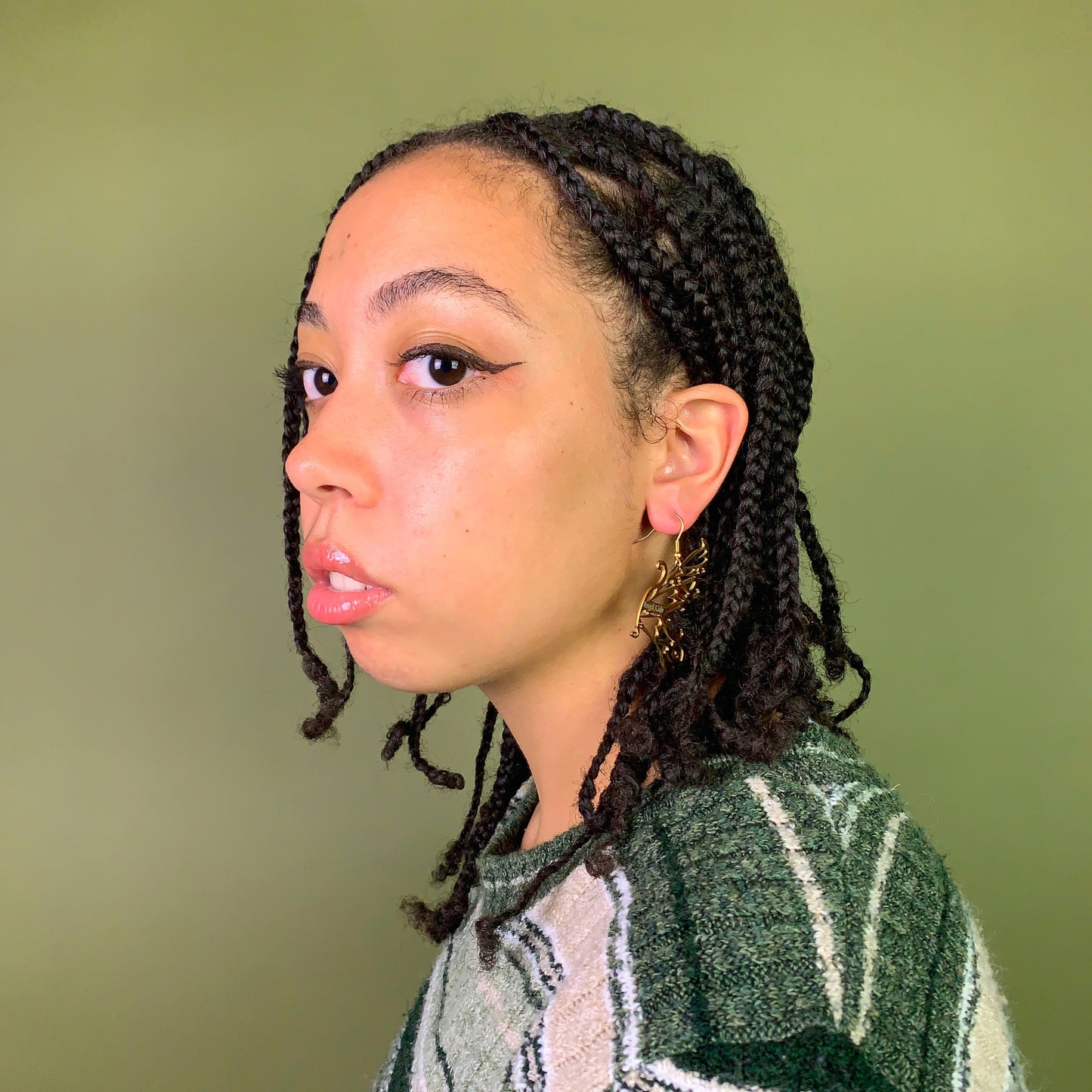 Model with Gold fairy earring