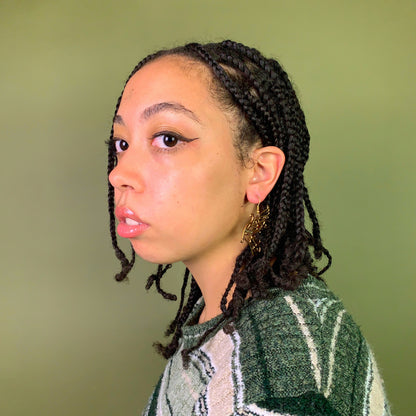 Model with Gold fairy earring