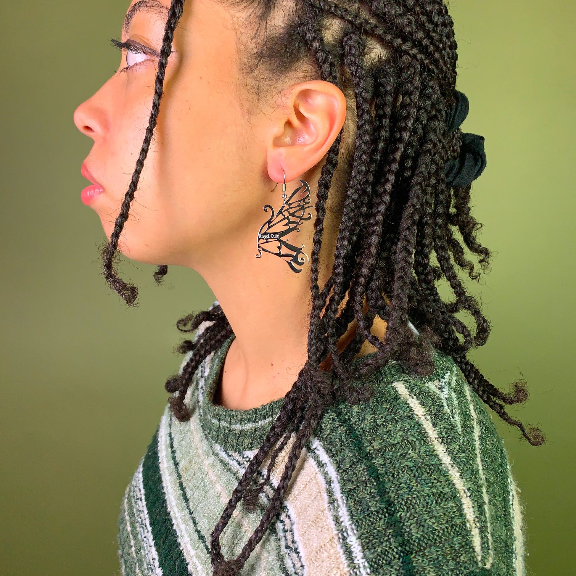 Model with silver fairy earrings